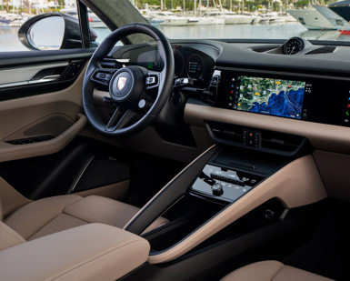 Porsche Macan-E steering wheel and infotainment system